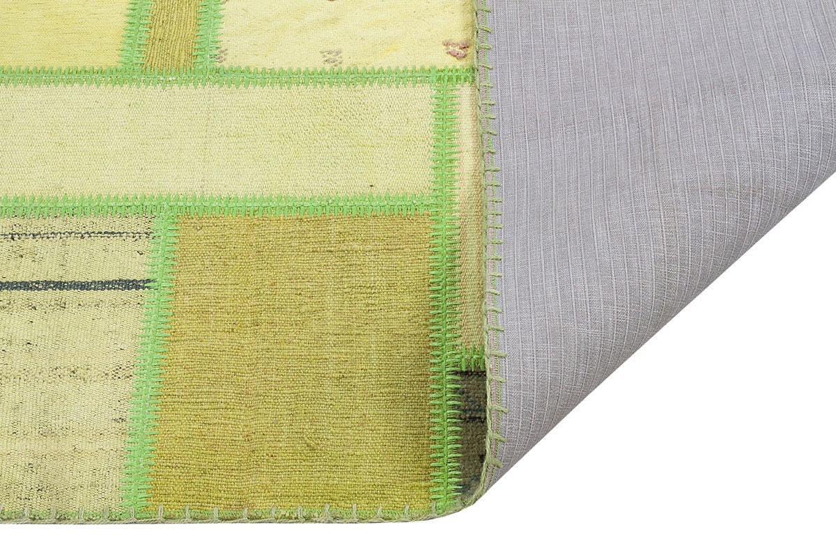 Handmade Green Patchwork Rug: 100% Wool Turkish Area Rug (3.9x5.6 ft)