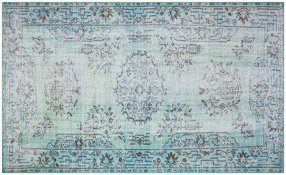 Vintage Turkish Wool Rug (5.2x8.7 ft): Handmade Anatolian Design