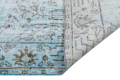 Vintage Turkish Wool Rug (5.2x8.7 ft): Handmade Anatolian Design