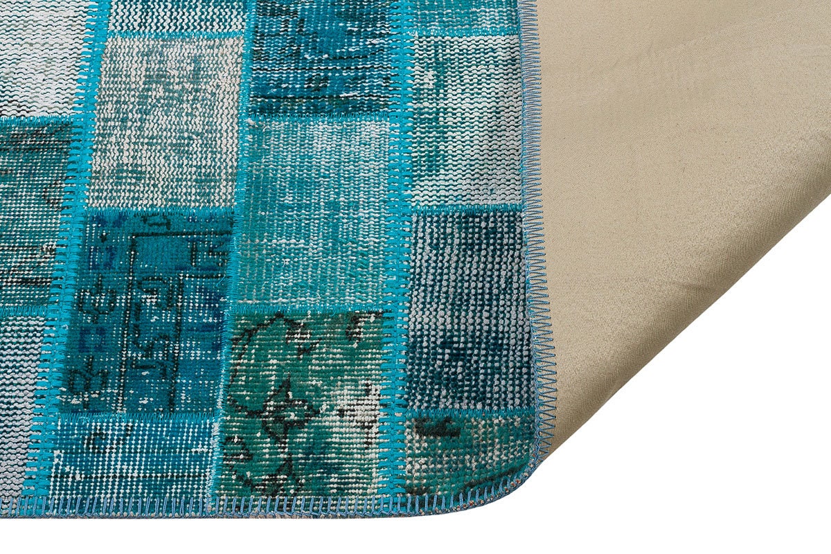 Handmade Green Wool Patchwork Rug: Bohemian Turkish Rug (5.4x7.9 ft)