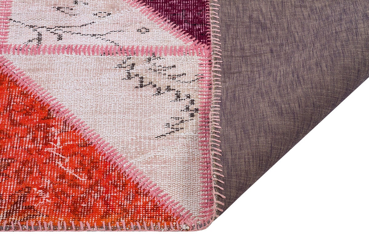 Handmade Wool Patchwork Rug: Bohemian Turkish Area Rug (5.4x8 ft)
