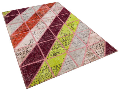 Handmade Wool Patchwork Rug: Bohemian Turkish Area Rug (5.4x8 ft)