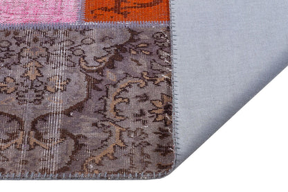 Handmade Pink Patchwork Wool Rug: Bohemian Turkish Area Rug