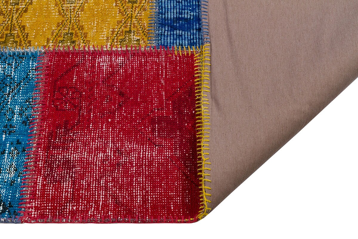 Handmade Wool Patchwork Turkish Rug: Bohemian Area Rug (6.9x9.8 ft)