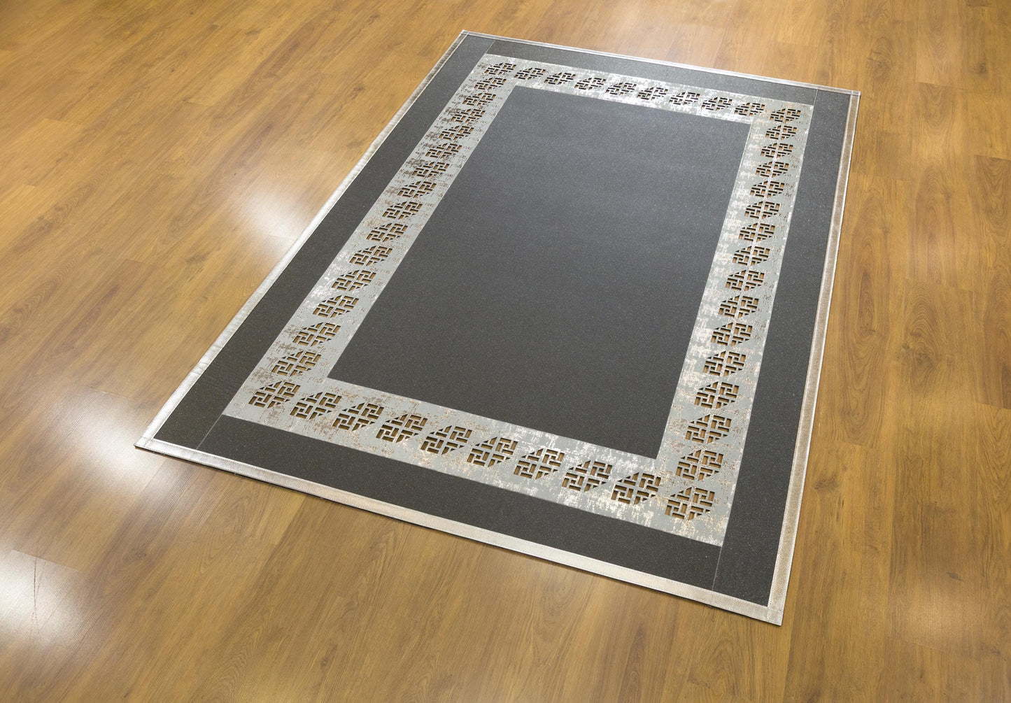 Black Faux Leather Rug: Laser Cut Silver Border, Modern Turkish Design (5x7 ft.)