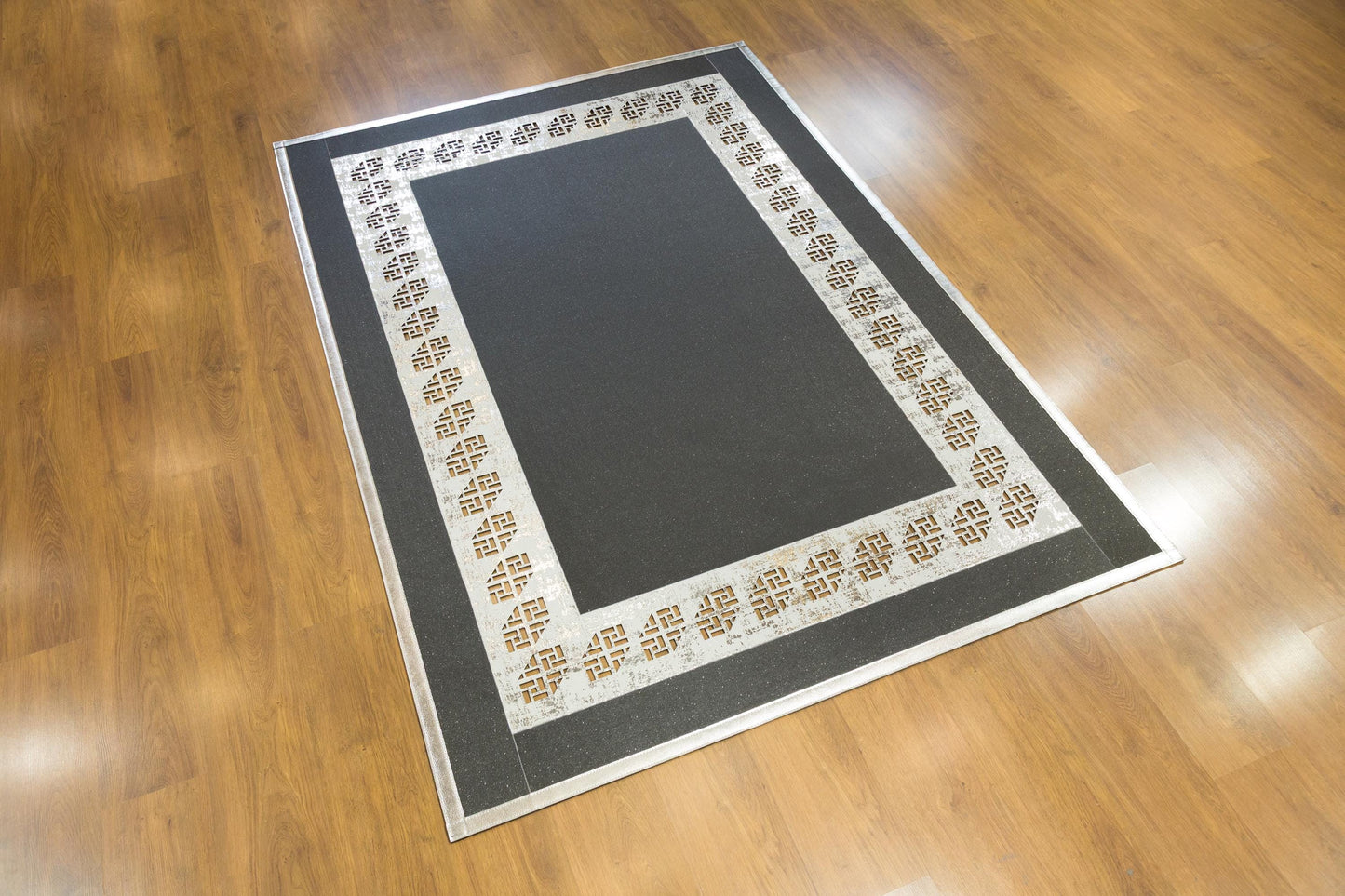 Black Faux Leather Rug: Laser Cut Silver Border, Modern Turkish Design (5x7 ft.)