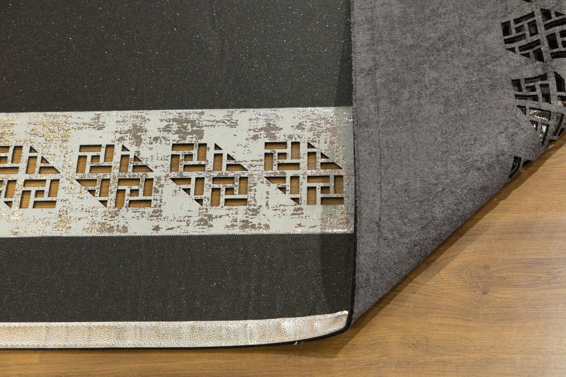 Black Faux Leather Rug: Laser Cut Silver Border, Modern Turkish Design (5x7 ft.)